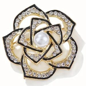 Elegant Gold and Black Floral Brooch